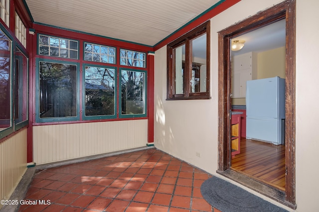 view of unfurnished sunroom