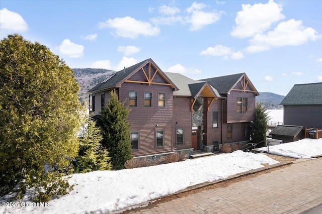 view of front facade featuring a mountain view