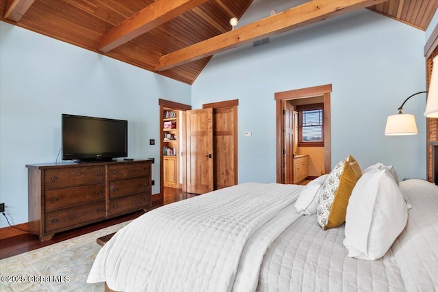 bedroom featuring wood ceiling, lofted ceiling with beams, and wood finished floors