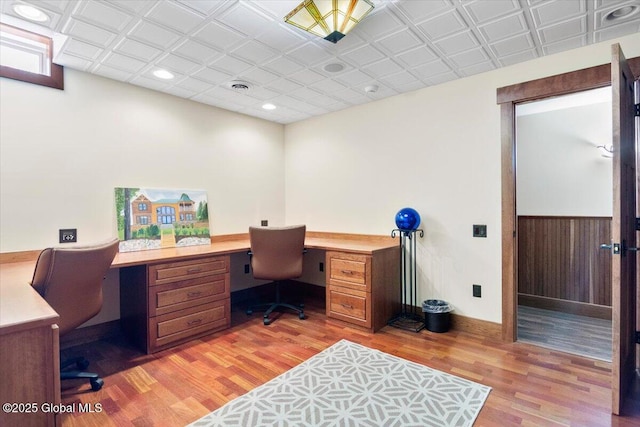 office area with recessed lighting, baseboards, visible vents, and light wood finished floors