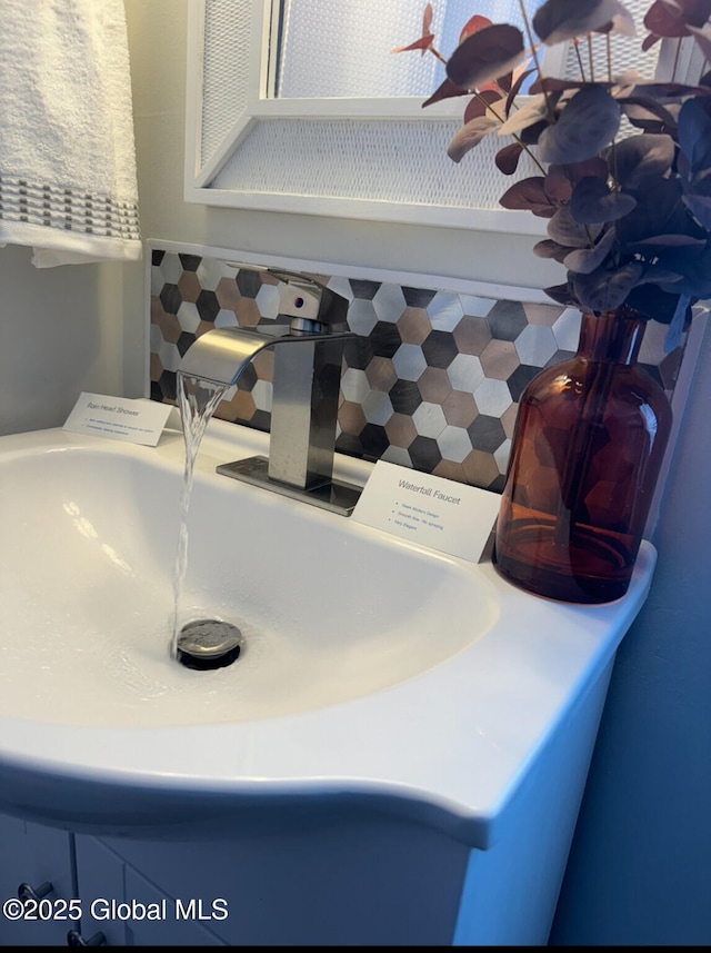 12 Berry Patch Way, Crown Point, NY 12928 - bathroom view of tasteful backsplash and vanity