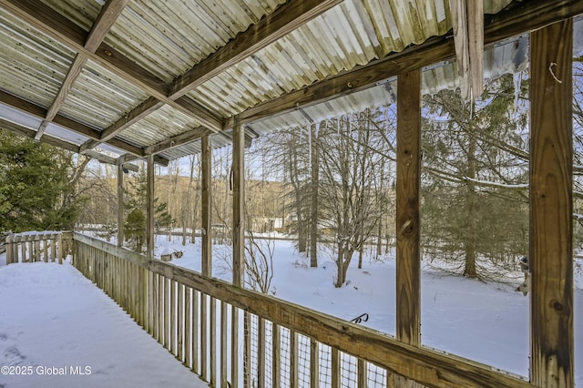 view of snow covered deck