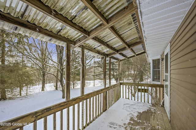 view of snow covered deck