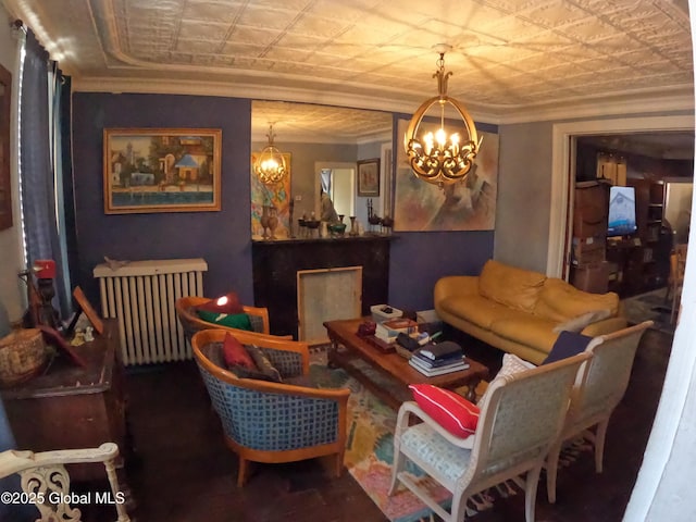22 Orr St, Troy, NY 12180 - living room with a chandelier, crown molding, radiator heating unit, and an ornate ceiling