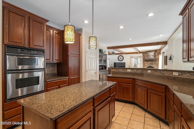 76 Barney Rd, Greenfield, NY 12850 - kitchen featuring double oven, recessed lighting, backsplash, open floor plan, and dark stone counters