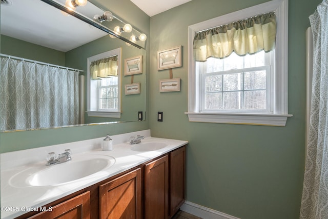 76 Barney Rd, Greenfield, NY 12850 - full bathroom featuring double vanity and baseboards