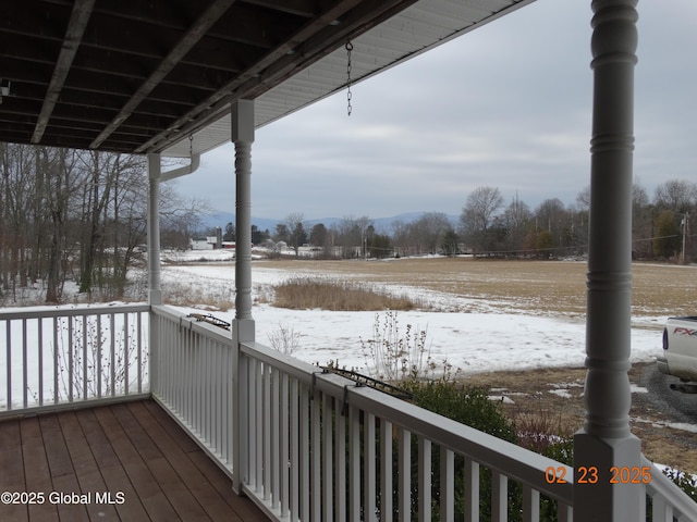 view of snow covered deck