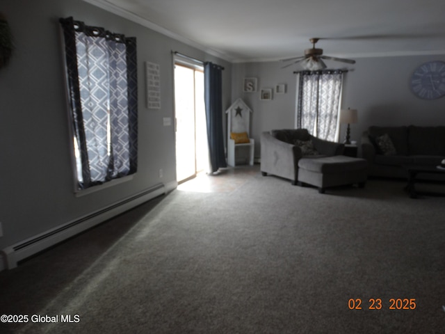 unfurnished living room with a baseboard heating unit, carpet, ornamental molding, and ceiling fan