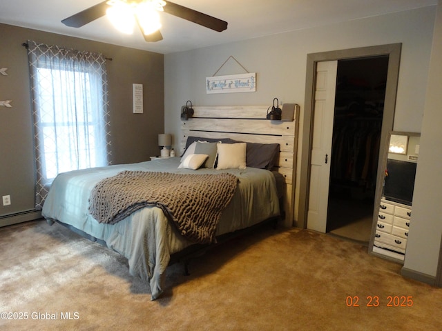 bedroom with light carpet and a ceiling fan