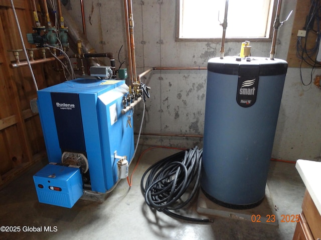 utility room featuring water heater and a heating unit