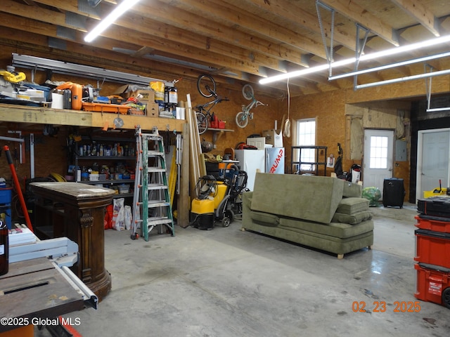 garage with a workshop area