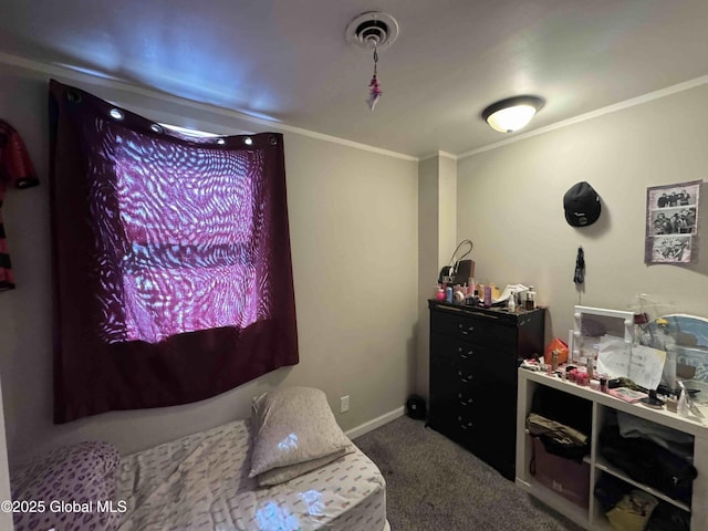 carpeted bedroom with ornamental molding, visible vents, and baseboards