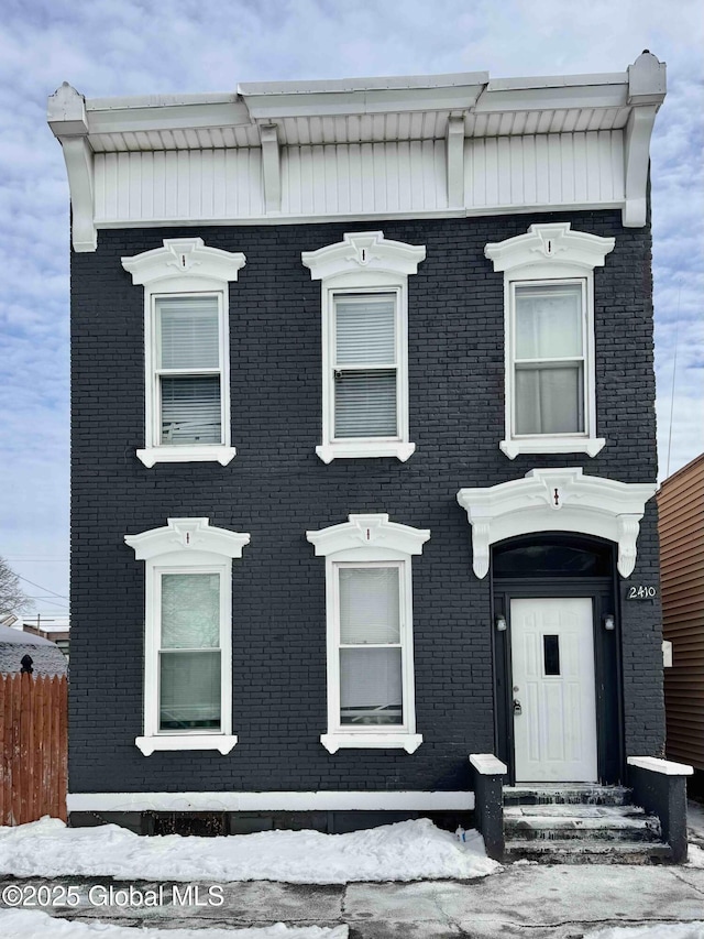 view of front of property with brick siding