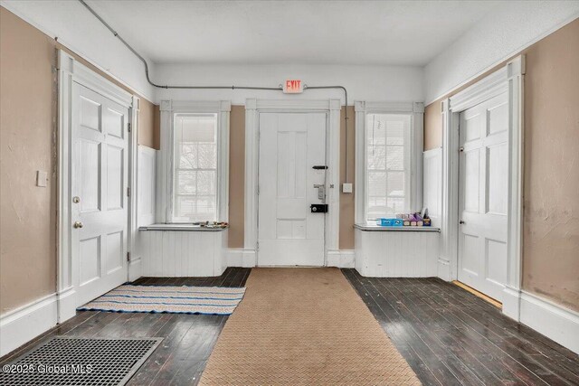 foyer entrance with dark wood finished floors