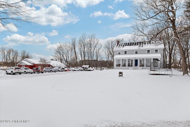 view of yard covered in snow