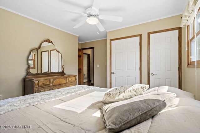 bedroom with a ceiling fan and crown molding