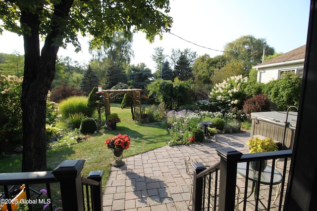 view of patio featuring a hot tub