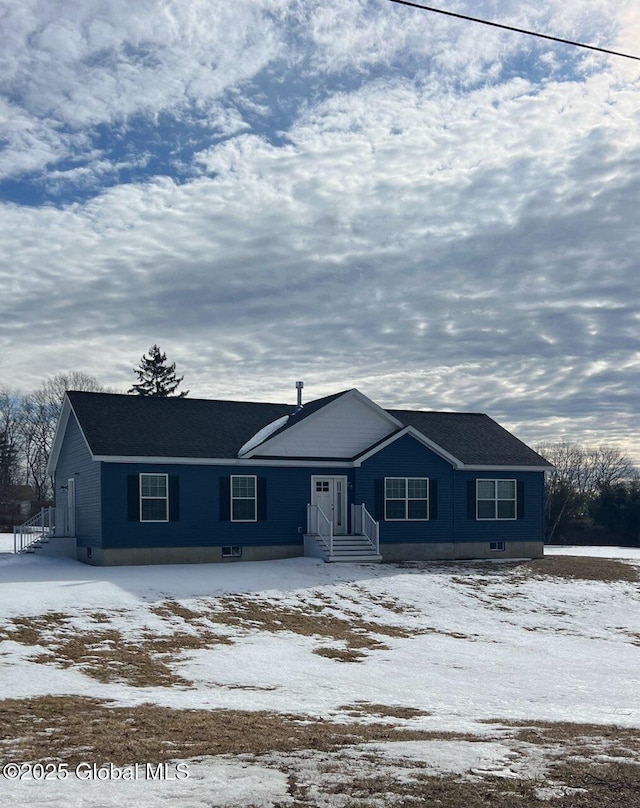 view of front of home with crawl space