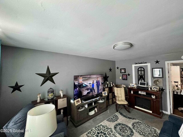 living room featuring a textured ceiling