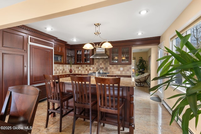 dining space with a chandelier and recessed lighting