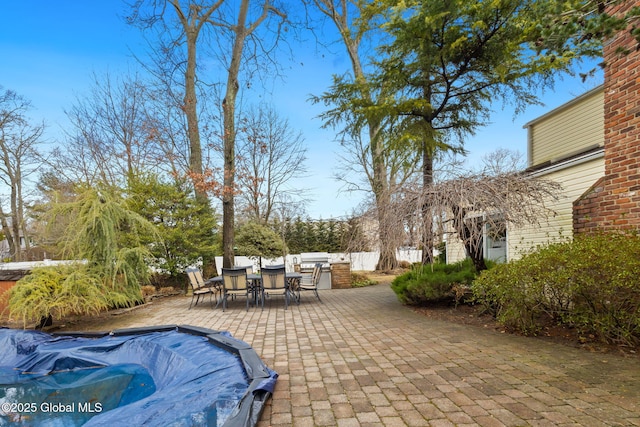 view of patio / terrace with fence and outdoor dining space