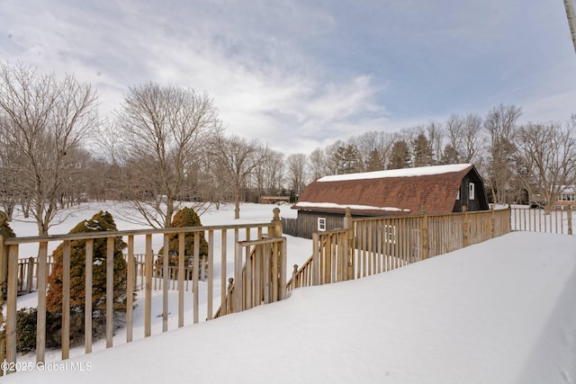 view of snow covered deck