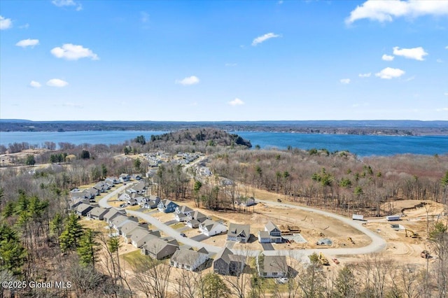birds eye view of property with a residential view and a water view