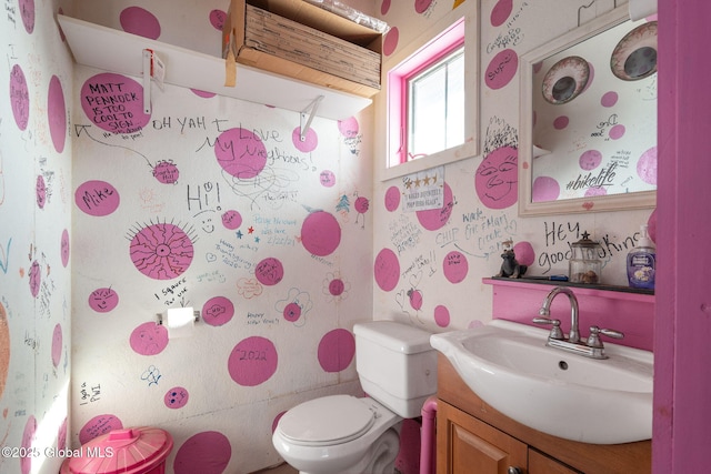 bathroom with vanity and toilet