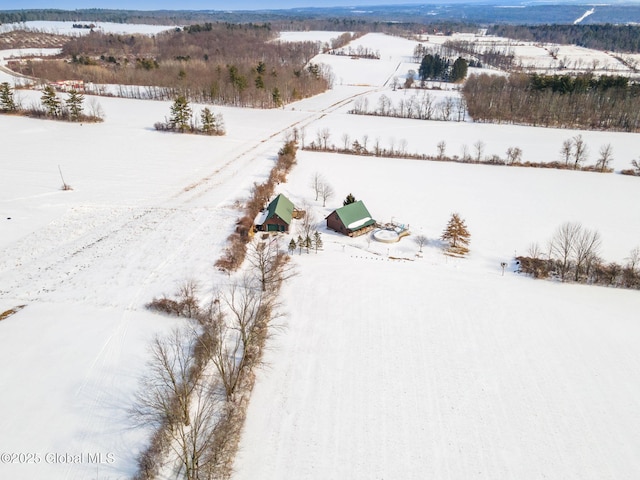 snowy aerial view with a rural view