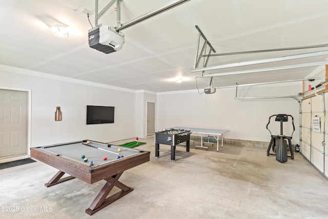 recreation room with a garage and concrete floors