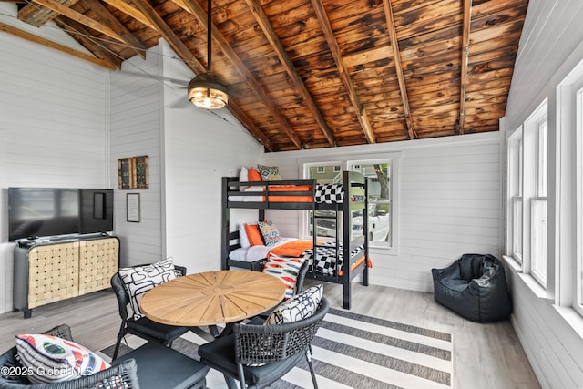 interior space featuring wood ceiling, plenty of natural light, and lofted ceiling with beams