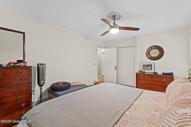 bedroom with a closet and a ceiling fan