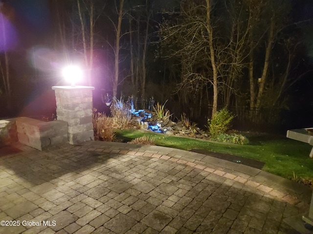 view of patio at night