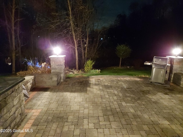 patio at night with grilling area