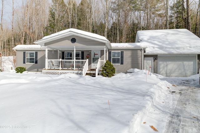 view of front facade with a garage and covered porch