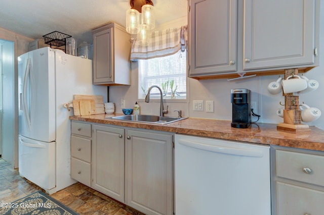 2 S Forty Rd, Hadley, NY 12835 - kitchen featuring light countertops, stone finish flooring, a sink, and white appliances