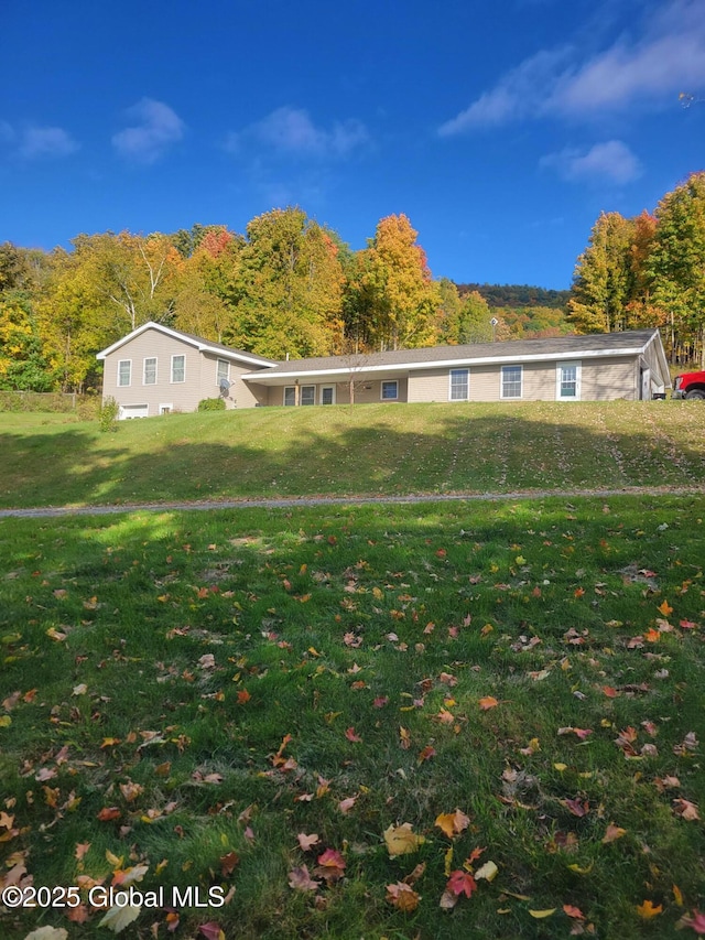 view of front of home with a front yard