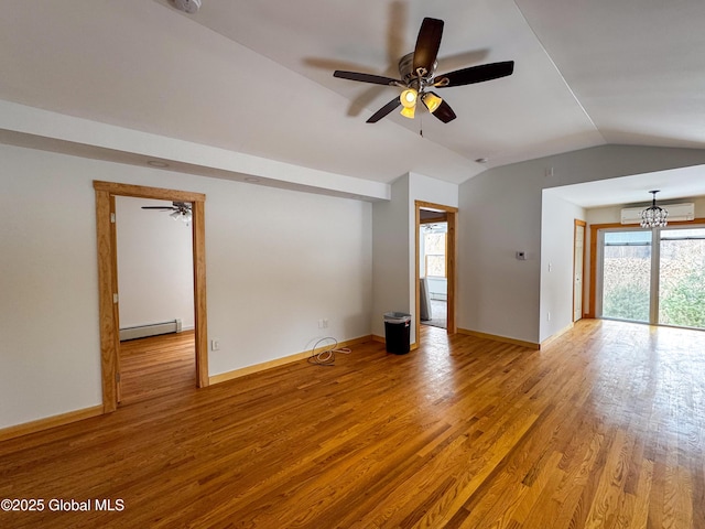 unfurnished living room with light wood finished floors, lofted ceiling, baseboard heating, a wall mounted air conditioner, and baseboards