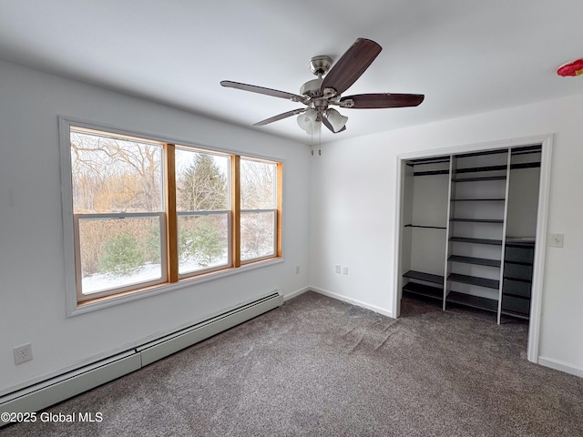 unfurnished bedroom with ceiling fan, a baseboard radiator, carpet floors, baseboards, and a closet