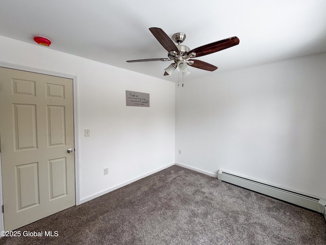 empty room featuring baseboards, dark carpet, baseboard heating, and ceiling fan