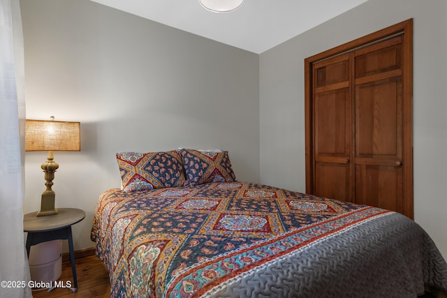 bedroom featuring wood finished floors