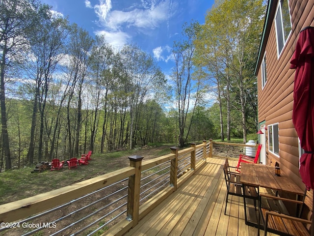 deck with a wooded view