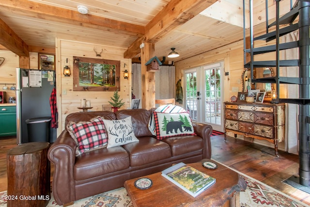 living room with wooden ceiling, wood walls, french doors, hardwood / wood-style floors, and beamed ceiling