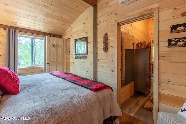 bedroom with vaulted ceiling, wood finished floors, wood ceiling, and wooden walls