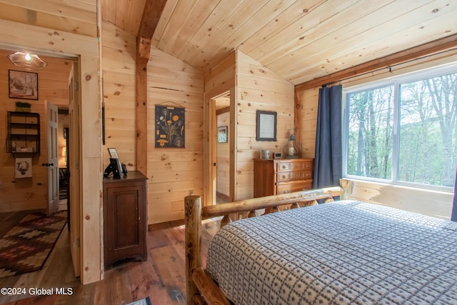 bedroom featuring vaulted ceiling, wood walls, wood ceiling, and hardwood / wood-style flooring