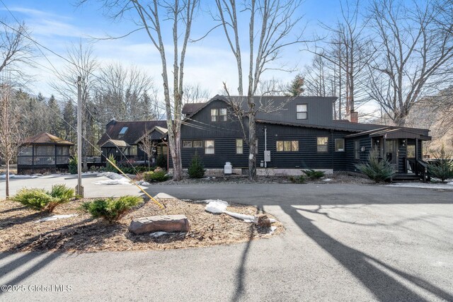 view of front of home with a chimney