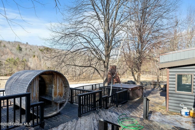 deck with a hot tub