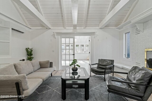 living room featuring wooden ceiling, lofted ceiling with beams, and wood finished floors