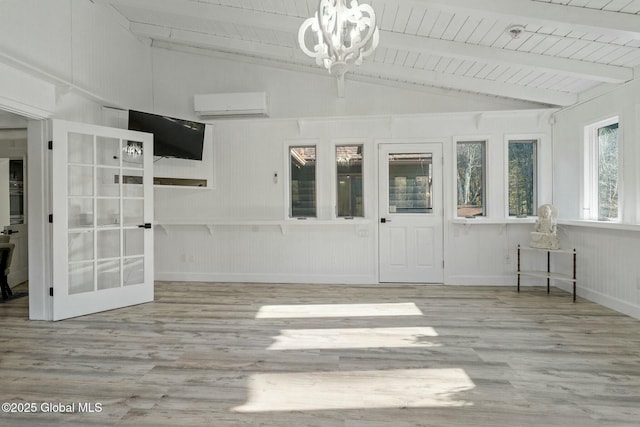 unfurnished sunroom with a chandelier, an AC wall unit, wooden ceiling, and vaulted ceiling with beams