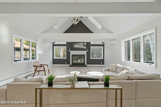 living area featuring baseboards, a glass covered fireplace, a wall unit AC, wood finished floors, and vaulted ceiling with beams